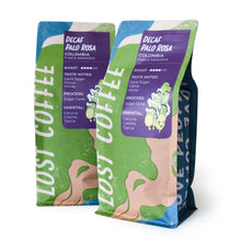 Load image into Gallery viewer, Two Lost Coffee packages with green and blue design on a white background
